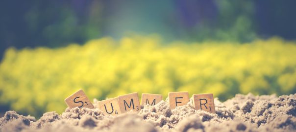 summer letter cube on soil